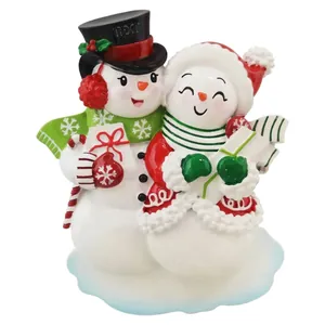 Customizable resin snowman couple Christmas tree ornament with festive gift and candy cane