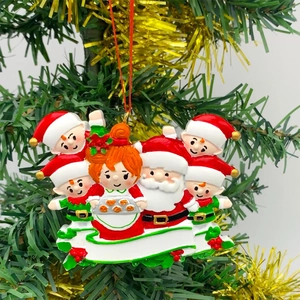 DIY Christmas resin ornament with Santa Claus family and white banner for personalization
