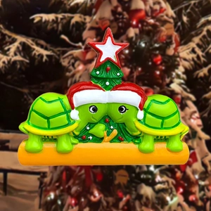 Detail of resin Christmas turtles hanging ornament with blank banner for customization