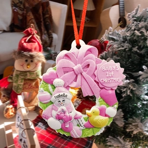 Pink resin baby's 1st Christmas ornament with a cute snowman and customized name feature