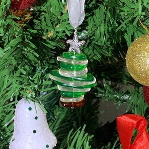 Sea glass Christmas tree ornament with starfish topper and white ribbon on tree