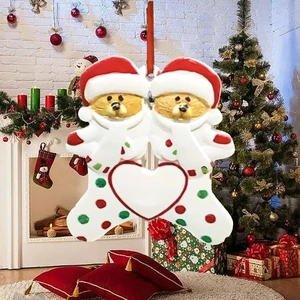 Close-up of dual Christmas bears resin ornament with blank white heart for DIY customization