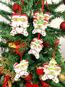 DIY Christmas brown bear family resin ornaments with customizable hearts on a festive tree