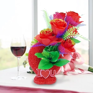 Detail of red resin floral ornament featuring I Love You text and glittery faux roses