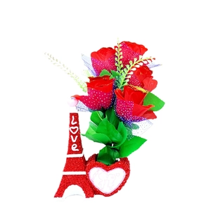 Red Eiffel Tower resin ornament with heart-shaped rose base and white LOVE lettering