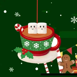 Detail of 2D acrylic Christmas hot cocoa mug ornament with cute marshmallows