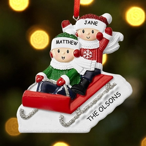 Custom resin Christmas sled ornament with personalized names Jane Matthew and The Olsons