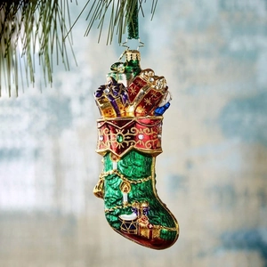 Hand-painted resin Christmas stocking ornament with colorful gift boxes on pine branch