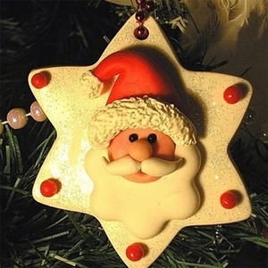 Hexagram Santa Claus resin ornament with red hat and white beard hanging on Christmas tree
