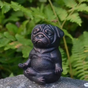 Meditating pug dog statue in bronze finish for zen garden and outdoor yoga decor