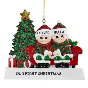 Resin Christmas tree and snowman couple ornament with Our First Christmas text