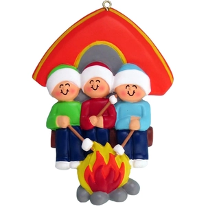 Christmas resin ornament with a family camping scene and roasting marshmallows near tent