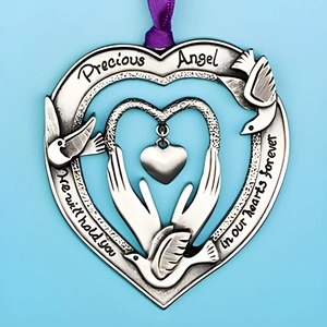 Detailed heart memorial ornament with dove and hands design and purple ribbon