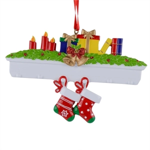 Christmas tree ornament with red candle gift boxes and hanging socks in resin