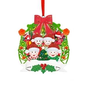 Christmas frog family ornament with green tree frame and red bow for holiday decor