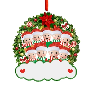 Close-up of personalized resin snowman family wreath with nine members for Christmas