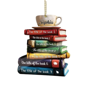 Custom stack of books ornament with a coffee cup on top and a golden hanging string