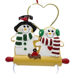 Christmas snowman couple ornament with heart detail on a rolling pin base