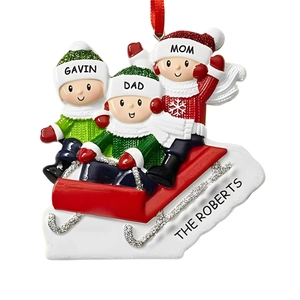 Detailed view of personalized skiing family Christmas ornament with custom names on resin
