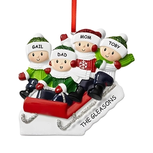 Family of four on a red sled resin Christmas ornament with hanging silk ribbon
