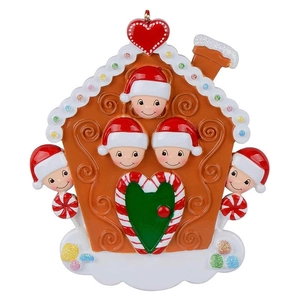 Detailed view of 5-member family gingerbread house ornament with glitter and candy cane decor