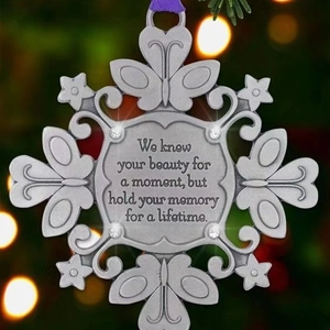 Silver snowflake butterfly memorial ornament with purple ribbon and sentimental text