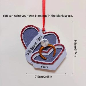 Detailed view of mauve heart ornament with gold ring accent and customizable text