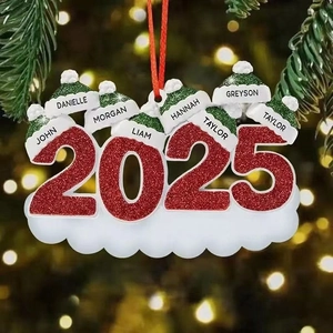 Detail of 2025 family Christmas ornament with seven glittery snowmen and red ribbon