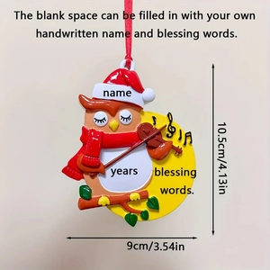 Detailed view of resin owl violin ornament with custom name and year engraving space