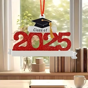 Detail of 2025 graduation ornament with black mortarboard and white scroll for DIY names