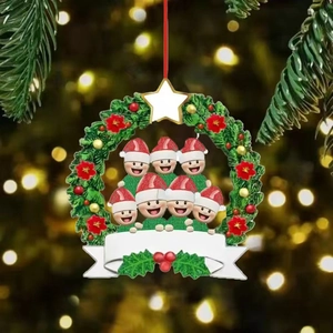 Detail of resin Christmas wreath ornament with seven snowmen and personalized banner