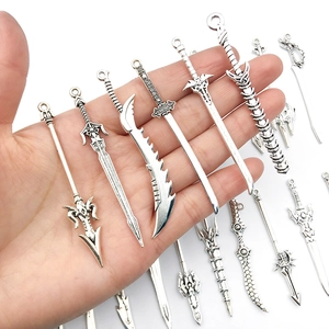 Collection of vintage silver alloy sword mini pendants for DIY jewelry and keychains