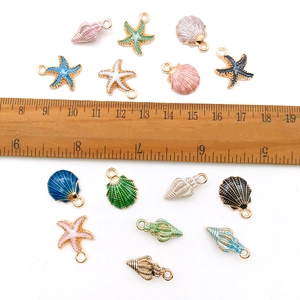 Ocean series alloy charms set with starfish and shells with a ruler for size