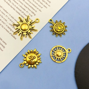 Golden sun face alloy charms for DIY jewelry making featuring creative hollow sun designs