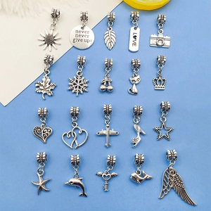 Detailed set of 20 silver alloy charms with hearts, snowflakes and animals for DIY bracelets