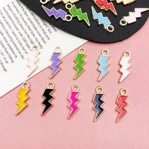 Close-up of lightning bolt enamel alloy charms in multiple colors for DIY jewelry making