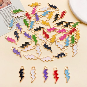 Close-up of lightning bolt alloy pendants in assorted colors for DIY jewelry making