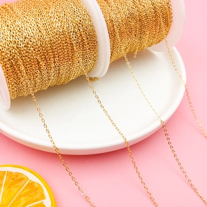 Detail of 18K gold-plated snake chains on spools for DIY jewelry making material
