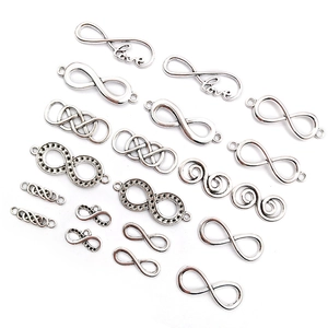 Detailed display of silver infinity symbol charms and love connectors for DIY jewelry making