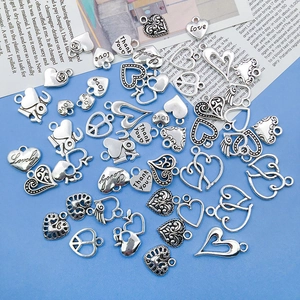 Detailed collection of silver heart-shaped alloy charms for DIY jewelry and necklaces