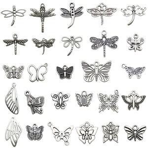 25 pieces of antique silver hollow butterfly and dragonfly charms for DIY jewelry making