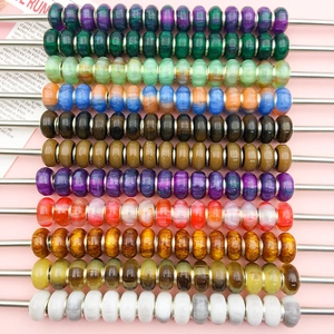 Detailed row of gradient cat-eye large hole beads in diverse colors for DIY bracelets