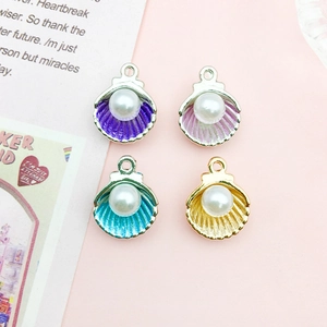 Set of four colorful shell alloy pendants with pearls for DIY jewelry making