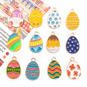 Set of 12 colorful Easter egg charms with rabbit and floral motifs for DIY jewelry