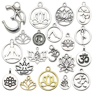 Collection of lotus and yoga meditation charms in antique silver and gold finishes