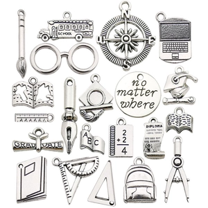 Retro silver graduation charms set featuring school bus, cap, and books for DIY jewelry