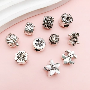 Macro detail of vintage silver alloy large hole beads for DIY bracelet jewelry making