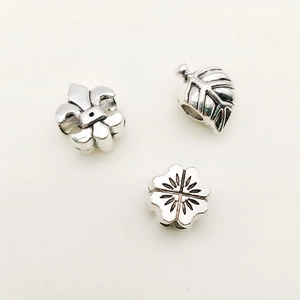 Silver alloy large hole beads with fleur-de-lis, leaf, and flower patterns for bracelets