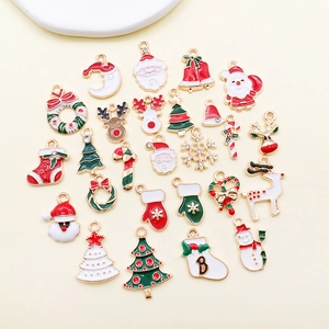 Macro detail of various colorful Christmas alloy enamel pendants for DIY jewelry making