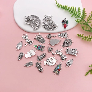 Detailed collection of vintage silver owl pendants with colorful rhinestones for DIY jewelry